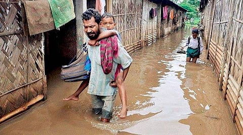 Assam flood toll hits 13, CM undertakes aerial visit