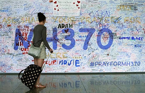 Suspected MH370 door found on French island