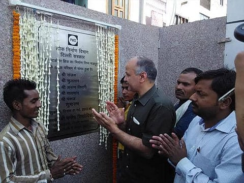 Manish Sisodia inaugurates foot over-bridge on Labor Day; Inauguration plaque contains names of construction workers