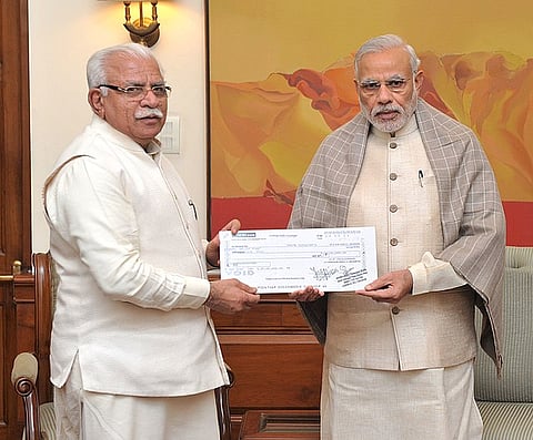 हरियाणा के मुख्यमंत्री मनोहर लाल खट्टर और प्रधानमंत्री नरेंद्र मोदी