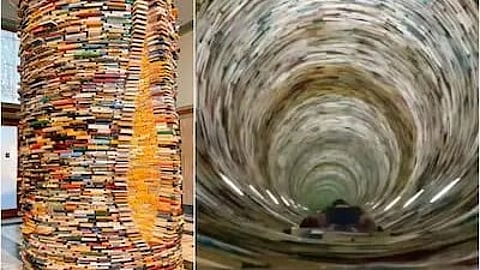 Infinity book tower, Prague: जब लोग इसके अंदर देखते हैं तो उनको किताबों की एक अंतहीन सुरंग दिखाई पड़ती है। (Wikimedia Commons)