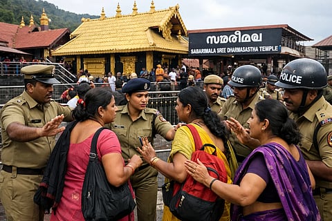 सबरीमाला मंदिर में महिलाओं के प्रवेश पर रोक लगाते पुलिसकर्मी