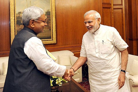 नीतीश कुमार और प्रधानमंत्री नरेंद्र मोदी। (Wikimedia Commons)