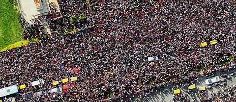 A large crowd gathered outside the Chinnaswamy Stadium in Bengaluru