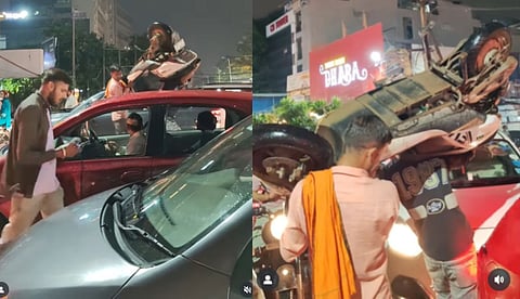 യാര് ഇവന് യാര് ഇവന്....., ട്രാഫിക് ബ്ലോക്കില് സ്കൂട്ടര് തോളിലേറ്റി യുവാക്കള്; വൈറലായി വീഡിയോ