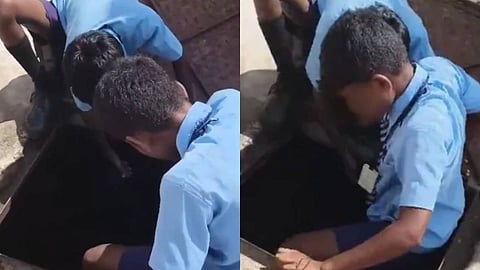 ശുചിമുറി വൃത്തിയാക്കാനായി വെള്ളം കോരുന്ന വിദ്യാർഥികൾ