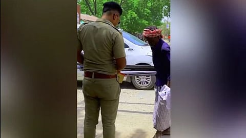 Cop helps cart-puller