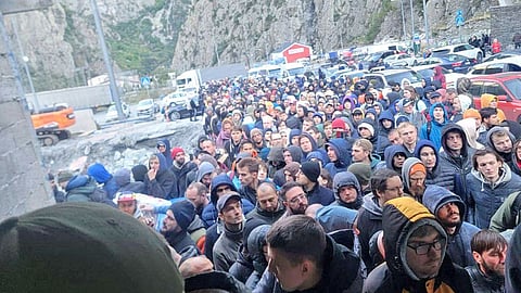 Russian men flee the country