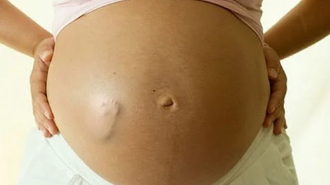 why babies kick in the womb