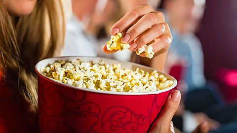 How Popcorn Became A Movie Theater Staple