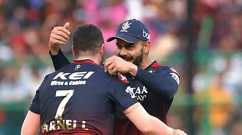 RCB vs RR : 59 ரன்களில் ராஜஸ்தானை சுருட்டிய பெங்களூரு - களத்தில் நடந்த மாயம் என்ன?