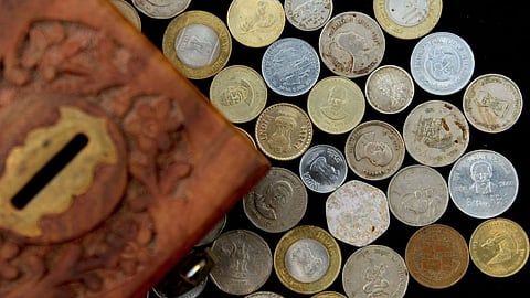 भारतीय रुपये के सिक्कों पर प्रतीक का कारण क्या है?