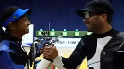 Gun shooting gold medal