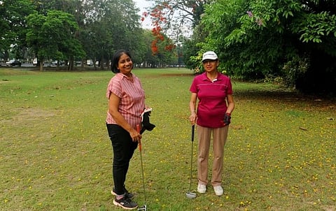 Captain Dhritipriya Raydasgupta and President Nina Singh take a break between the shots