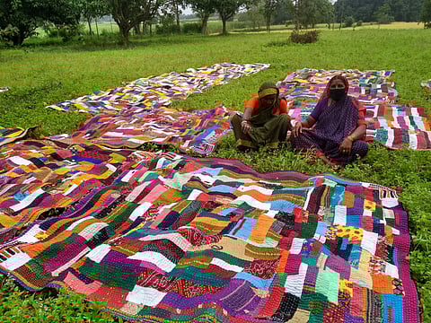 The quilts are hand stitched and it can take months of work to create them