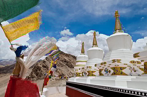 Stupas and prayer flags at Thiksey monastery in Leh