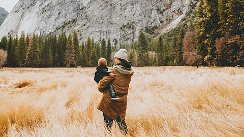 Woman carrying a baby