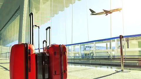 Stack of travelling luggage in the airport terminal