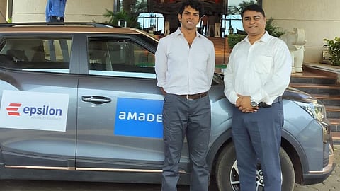 Sushil Reddy (on left) with his e-car