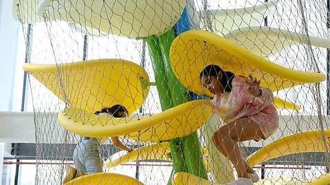 Children playing inside the museum