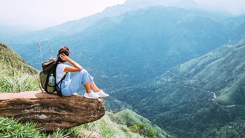 Hiker at the top Little Adam's hike trail, Sri Lanka