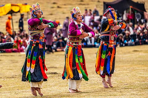 Cham dancers from Singkar Lauri village in Jomotsangkha Dungkhag performing a traditional dance called “Achi Lhamo”