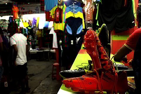 Boots on sale at the Maidan Market in Kolkata