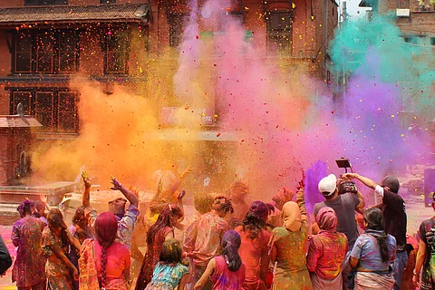 People immersed in the celebrations of Holi