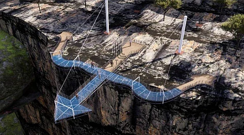 The glass skywalk is set against the beauty of the Tulsi Waterfalls in Chitrakoot district