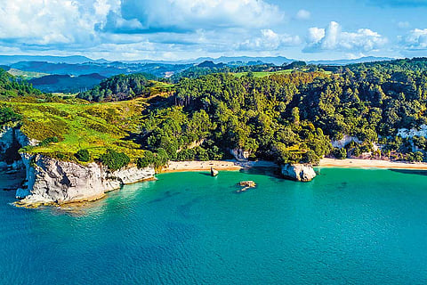 An aerial view of a beach in Coromandel, New Zealand