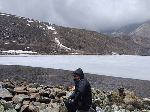 The lake radiates a profound sense of peace and tranquility