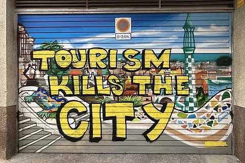 Protest sign against overtourism