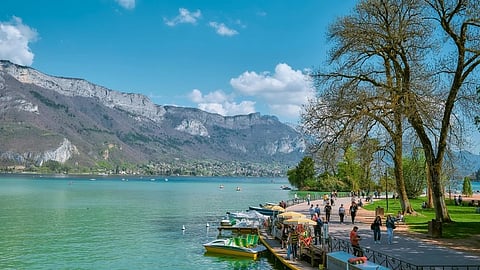 best time to visit no longer exists tourists enjoy empty beach, mountain, lake