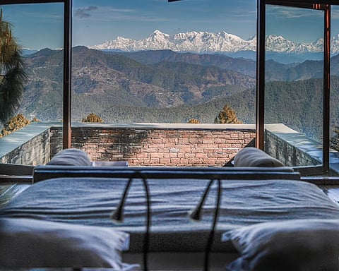 Wake up to tranquil mountain views at The Kumaon