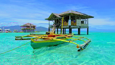 A wooden boat on the sea in the Philippines
