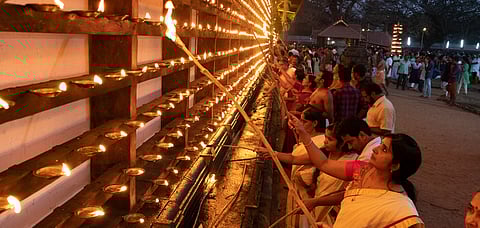 People light diyas in Vadakkumnathan temple in Thrissur