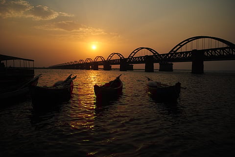 The sun sets over the Godavari Arch Bridge in Rajahmundry