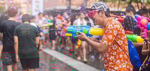Water battles are a common sight during Songkran
