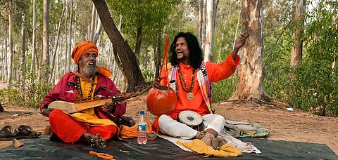 Traditional baul folk singers perform during the annual Poush Mela fair