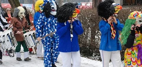 The three-day carnival has locals dress up in a variety of vivid costumes and throw confetti around. Credit Shutterstock