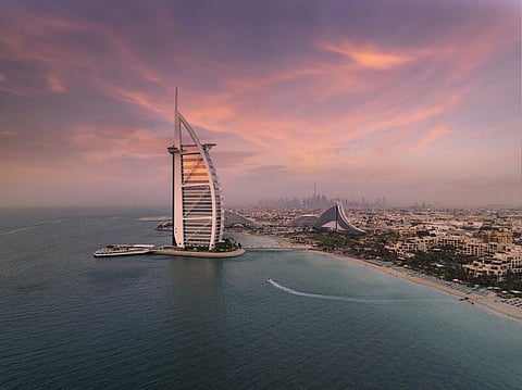 The Burj Al Arab stands proud against the city skyline