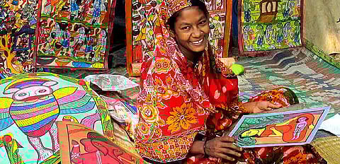 A Bengali patua or chitrakar (painter singer) in Naya village in Pingla block of West Midnapore
