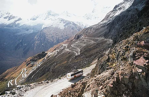 You may fly into Cuzco - but for great views, take a bus