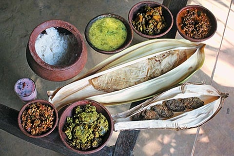 Malvani cuisine staples served in earthen pots and areca fronds at Maachli Farmstay
