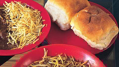 Salli gosh is a meat dish sprinkled with deep fried potato strips