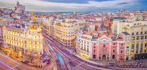 Downtown Madrid, Spain, where the Calle de Alcala meets the Gran Via. These are two of the most famous and busy streets in Madrid.