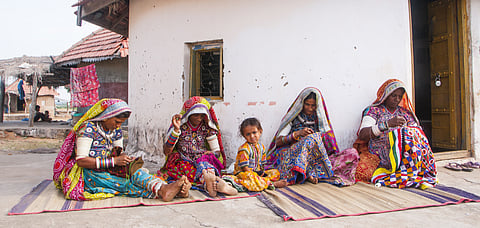 Women in front of their house in a local village near Bhuj