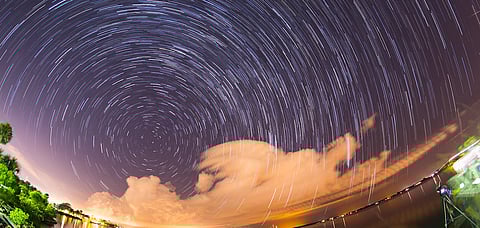 Shining blend of star trails and meteors