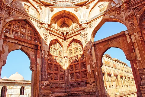 Ruins with intricate carvings at the historical Nagina Masjid in the Champaner-Pavagadh Archaeological Park in Gujarat