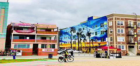 A vibrant street art on the side of a building